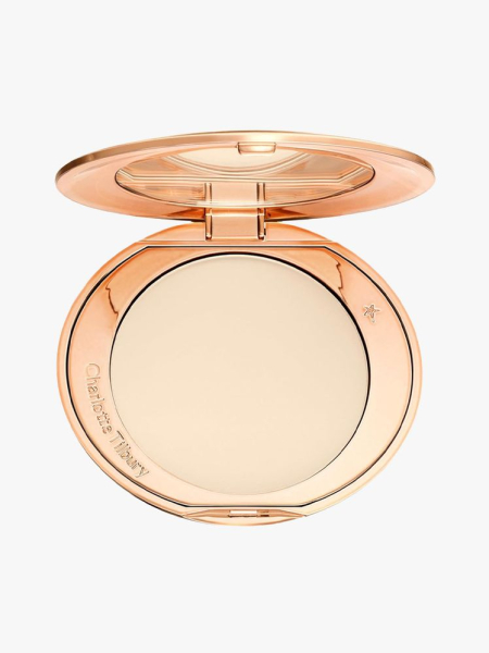 Charlotte Tilbury Airbrush Flawless Finishing Powder in branded component on a light gray background